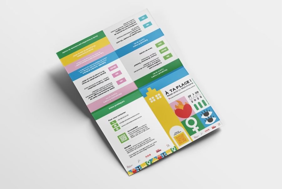 The A6 leaflet unfolded, the programme laid out in coloured bands, one per day.