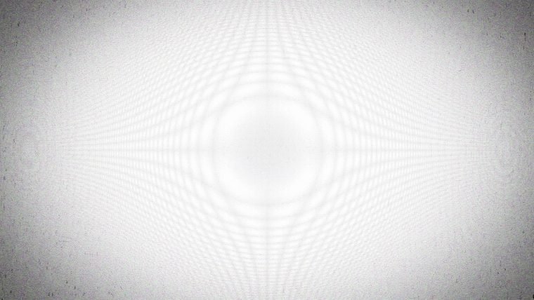 A white field of concentric rings filling the frame.